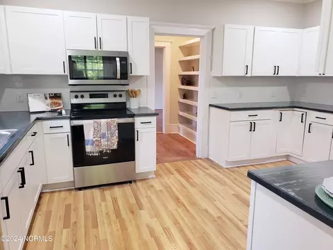 Kitchen - 119 Maple St, Brunswick, NC 28424 photo 2 of 3
