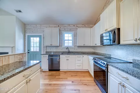 Kitchen - 109 E Stockton Pl, Hampstead, NC 28443 photo 3 of 5