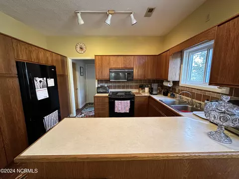 Kitchen - 601 Cordgrass Rd, Hampstead, NC 28443 photo 1 of 3
