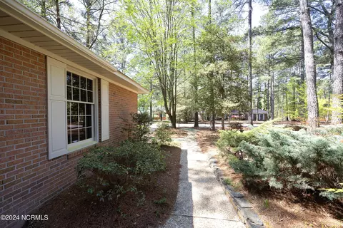 Exterior - 320 Lake Forest Dr, Pinehurst, NC 28374 photo 4 of 11