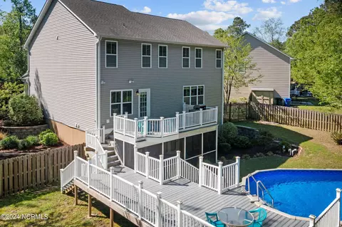 Exterior - 126 Roughleaf Trl, Hampstead, NC 28443 photo 9 of 14