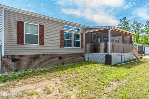 Exterior - 209 Dirt Rd, Hamlet, NC 28345 photo 5 of 21