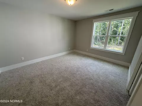 Bedroom - 145 Allbrook Way, Hampstead, NC 28443 photo 2 of 2
