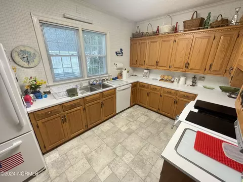 Kitchen - 120 E John St, Mount Olive, NC 28365 photo 2 of 3