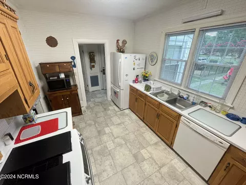 Kitchen - 120 E John St, Mount Olive, NC 28365 photo 3 of 3