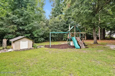 Exterior - 130 Deerfield Dr, Hampstead, NC 28443 photo 8 of 11