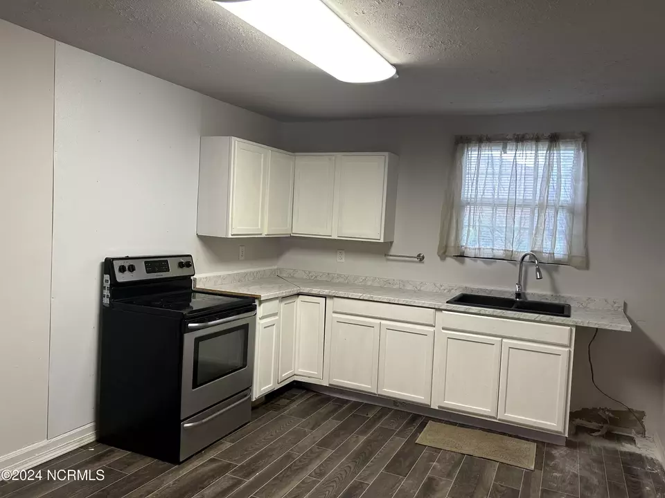 Kitchen - 305 2nd St, Laurinburg, NC 28352 photo 1 of 1