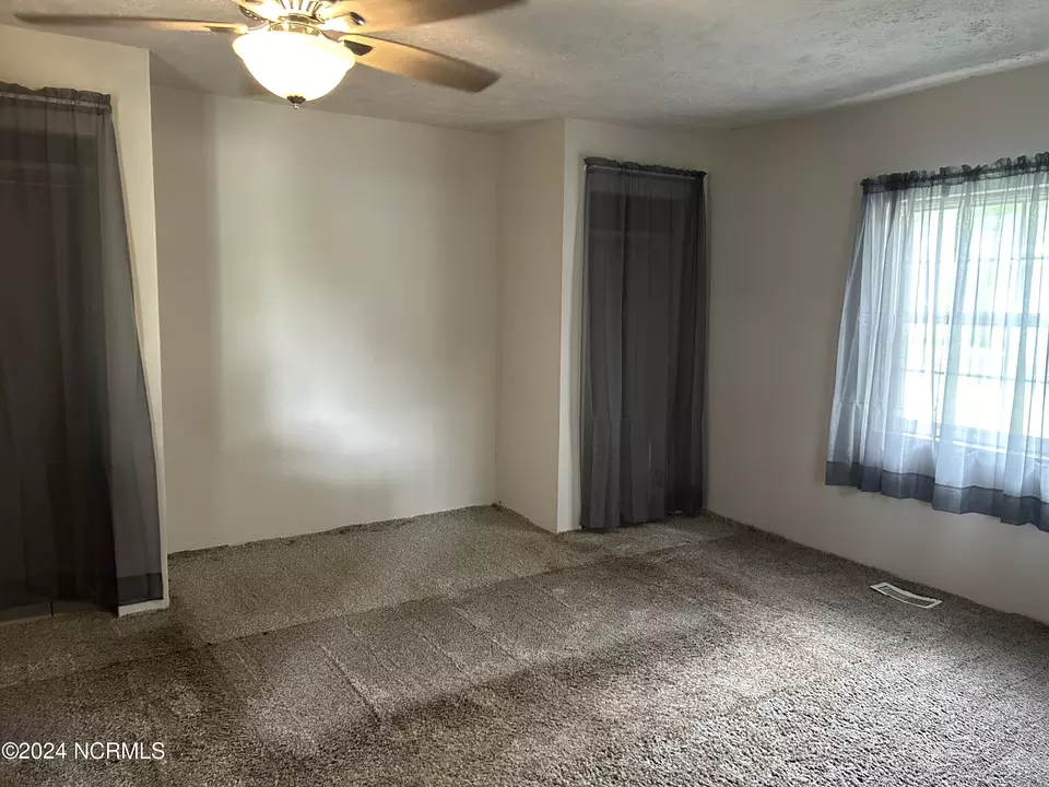 Bedroom - 305 2nd St, Laurinburg, NC 28352 photo 2 of 3