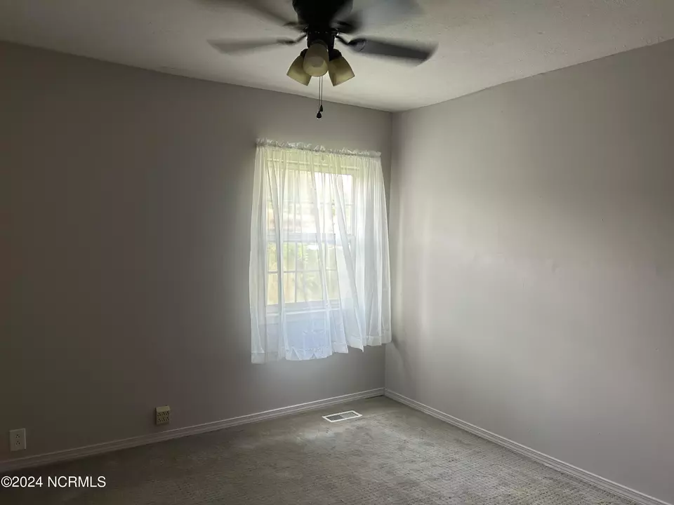 Bedroom - 305 2nd St, Laurinburg, NC 28352 photo 3 of 3
