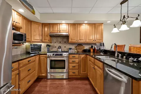 Kitchen - 100 Drake Rd, Hampstead, NC 28443 photo 8 of 9