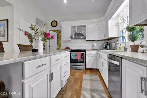 Kitchen - 112 White Heron Cove Rd, Hampstead, NC 28443 photo 3 of 4