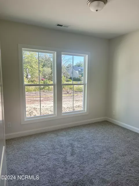 Bedroom - 331 Masters Ln # -A, Hampstead, NC 28443 photo 4 of 11