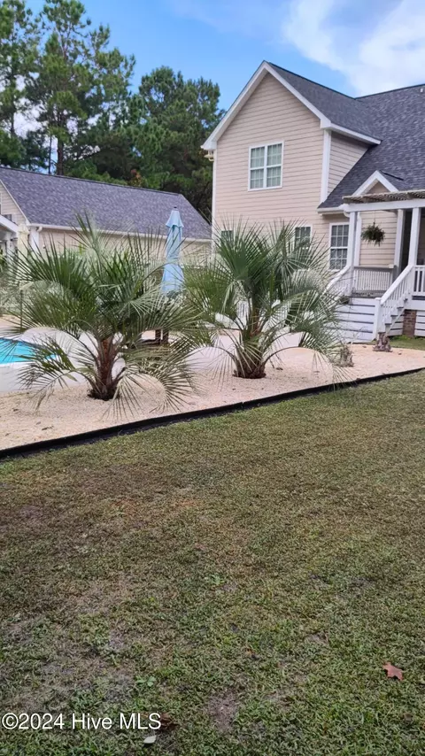 Exterior - 310 Headwaters Dr, Hampstead, NC 28443 photo 6 of 13