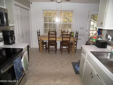 Kitchen - 601 N Walnut St, Spring Hope, NC 27882 photo 1 of 2