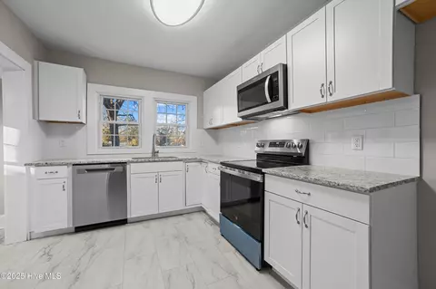 Kitchen - 117 Reddick St, Williamston, NC 27892 photo 1 of 2