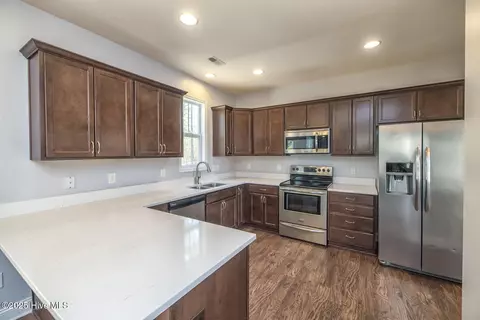 Kitchen - 116 Bunchberry Ct, Hampstead, NC 28443 photo 3 of 4