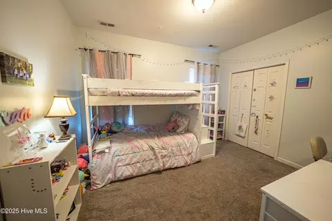 Bedroom - 105 E Stockton Pl, Hampstead, NC 28443 photo 5 of 6