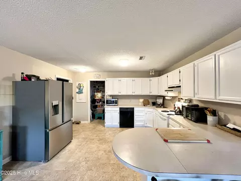 Kitchen - 511 Icaria Rd, Tyner, NC 27980 photo 2 of 4