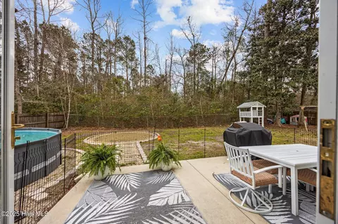 Exterior - 129 Pebble Beach Dr, Hampstead, NC 28443 photo 4 of 7