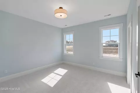 Bedroom - 285 Planters Walk, Hampstead, NC 28443 photo 5 of 7