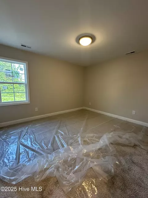 Bedroom - 204 Shadow Grass Ct, Stella, NC 28582 photo 4 of 5