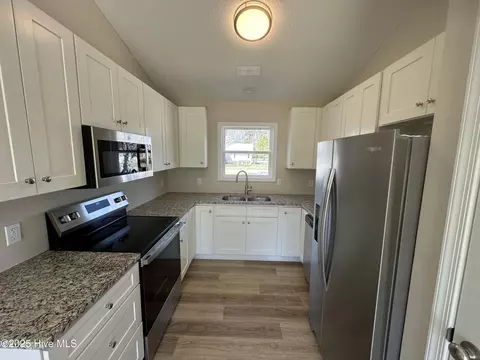 Kitchen - 107 Sunny Ln, Grandy, NC 27939 photo 3 of 5