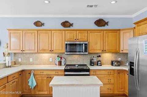 Kitchen - 352 E Second St, Ocean Isle Beach, NC 28469 photo 3 of 7
