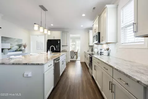 Kitchen - 208 Bachmans Trl, Hampstead, NC 28443 photo 3 of 5