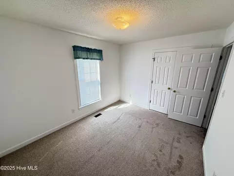 Bedroom - 122 Tarheel Dr, Mount Olive, NC 28365 photo 2 of 4