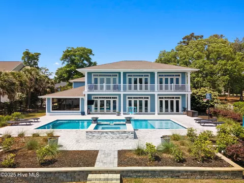 Exterior - 220 Shoreline Dr E, Sunset Beach, NC 28468 photo 2 of 10