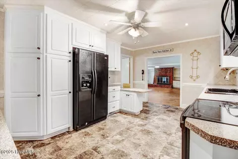 Kitchen - 1436 Firetower Rd, Selma, NC 27576 photo 2 of 2
