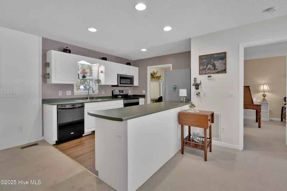 Kitchen - 307 Norton St, Oak Island, NC 28465 photo 2 of 3