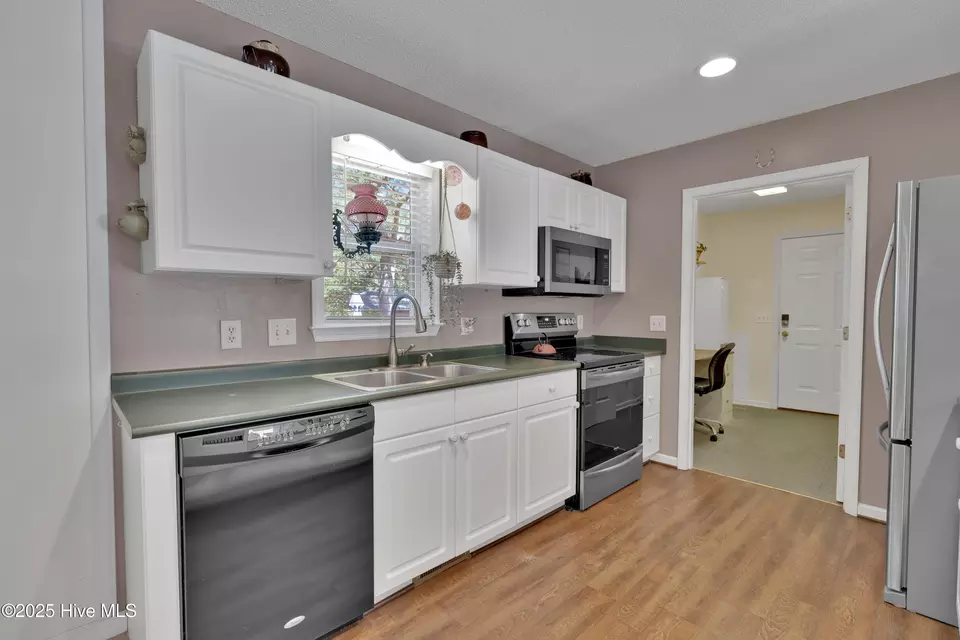 Kitchen - 307 Norton St, Oak Island, NC 28465 photo 3 of 3