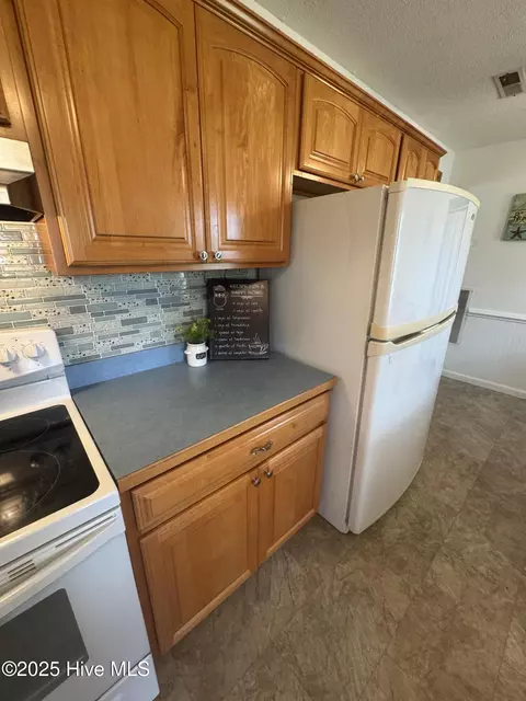 Kitchen - 648 Shell Hill Rd, Sea Level, NC 28577 photo 4 of 6