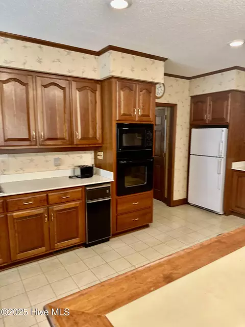Kitchen - 109 Conway Rd, Fair Bluff, NC 28439 photo 12 of 16