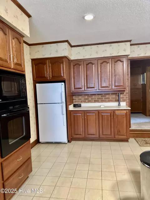 Kitchen - 109 Conway Rd, Fair Bluff, NC 28439 photo 8 of 16