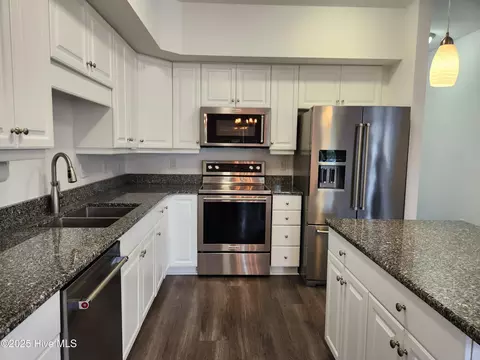 Kitchen - 300 Lighthouse Ln #A-3, Cedar Point, NC 28584 photo 1 of 2