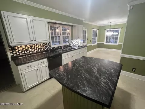 Kitchen - 313 E 1st Ave, Chadbourn, NC 28431 photo 1 of 2
