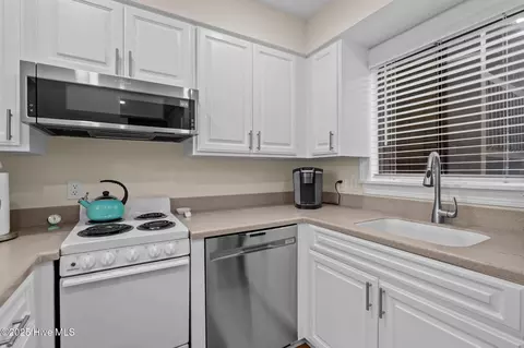 Kitchen - 85 Pine Valley Rd # 65, Pinehurst, NC 28374 photo 1 of 4