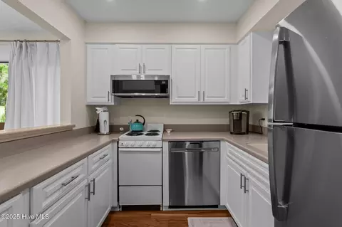 Kitchen - 85 Pine Valley Rd # 65, Pinehurst, NC 28374 photo 3 of 4