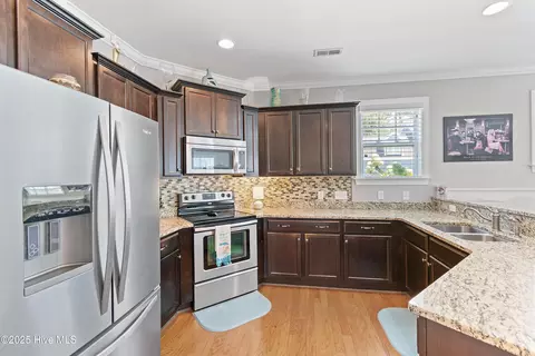 Kitchen - 4877 Frasier Cir, Shallotte, NC 28470 photo 4 of 6