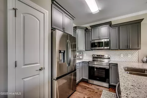 Kitchen - 7607 Privateer Loop, Sunset Beach, NC 28468 photo 2 of 2
