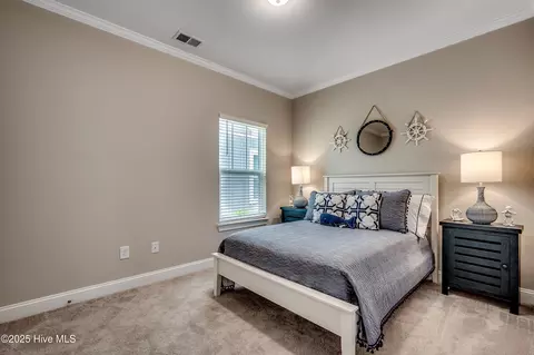 Bedroom - 7607 Privateer Loop, Sunset Beach, NC 28468 photo 2 of 3