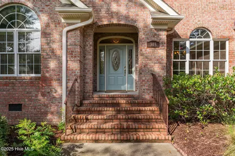 Exterior - 305 Tall Ships Ln, Hampstead, NC 28443 photo 2 of 11
