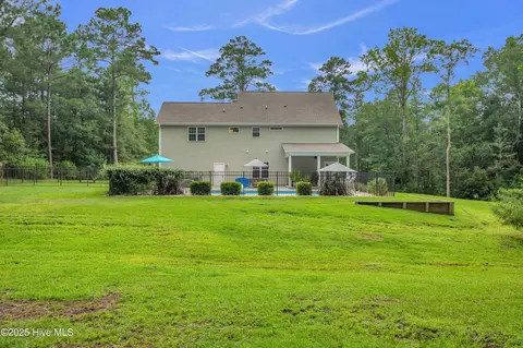 Exterior - 102 Chuckanut Dr, Hampstead, NC 28443 photo 6 of 11