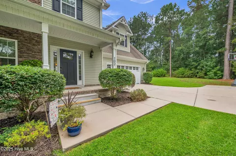 Exterior - 102 Chuckanut Dr, Hampstead, NC 28443 photo 2 of 11
