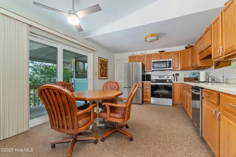 Dining - 160 Arborvitae Dr, Pine Knoll Shores, NC 28512 photo 3 of 5