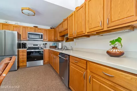 Kitchen - 160 Arborvitae Dr, Pine Knoll Shores, NC 28512 photo 2 of 2