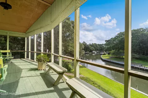 Exterior - 160 Arborvitae Dr, Pine Knoll Shores, NC 28512 photo 1 of 14