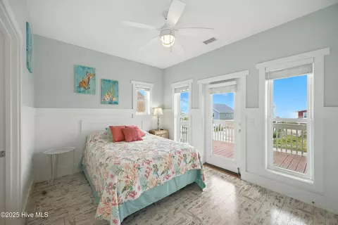 Bedroom - 451 E Third St, Ocean Isle Beach, NC 28469 photo 3 of 5